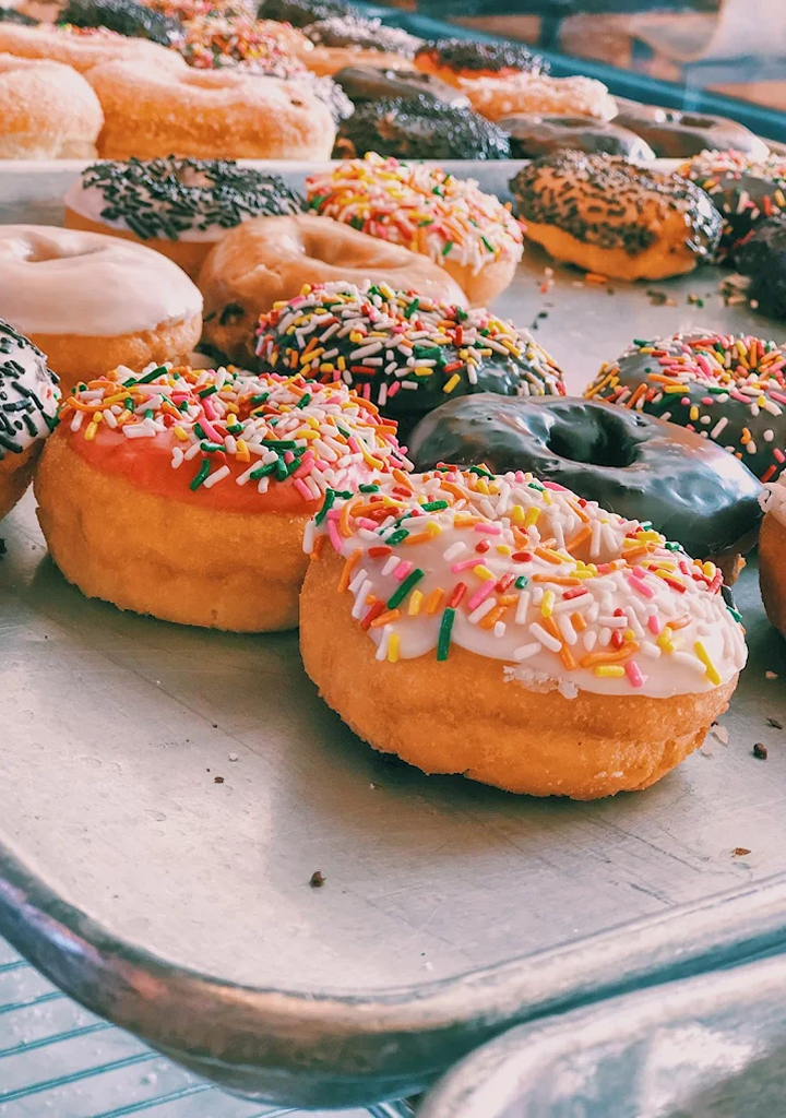 Colorful fresh donuts with sprinkles